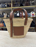 Basket bag in palm leaf and calfskin